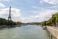 Seine River and the Eiffel Tower under a beautiful blue sky Royalty Free Stock Photo