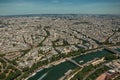 Seine River, greenery and buildings in a sunny day, seen from the Eiffel Tower top in Paris. Royalty Free Stock Photo