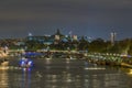 Seine River and Tourists Cruises at Night in Paris Seine River and Famous Monuments Royalty Free Stock Photo