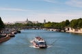 Seine river with tourists ship in Paris Royalty Free Stock Photo