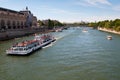 Seine river with tourists ship in Paris Royalty Free Stock Photo
