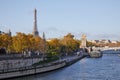 Seine river view with docks, Eiffel tower and Alexander III bridge in a sunny day in Paris Royalty Free Stock Photo