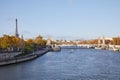 Seine river view with Eiffel tower and Alexander III bridge in a clear sunny autumn day in Paris Royalty Free Stock Photo