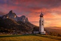 Seis am Schlern, Italy - Famous St. Valentin Church and famous Mount Sciliar with spectacular colorful autumn sunset