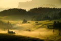 Seiser Alm Alpe di Siusi with Langkofel mountain at sunrise in summer, Italy