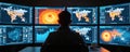 Seismologist studies seismic activity on multiple screens. Data analysis, vibrant visuals focus on critical information. Modern Royalty Free Stock Photo