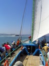 Seixal, Portugal. June 20, 2023: Tourists enjoying a cruise aboard the sailboat Amoroso, a historical, typical or traditional Royalty Free Stock Photo