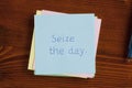 Seize the day handwritten on a note