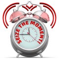 Seize the moment. The alarm clock with an inscription Royalty Free Stock Photo