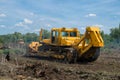 Seizure of forest land for agriculture. Destruction of forests with bulldozer.