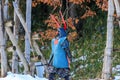 Sekigahara, Japan - December 25, 2022: Man dressed for battle in traditional samurai style walks through snow