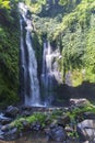 Sekumpul Waterfalls surrounded by tropical forest in Bali, Indonesia