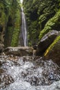 Sekumpul Waterfalls surrounded by tropical forest in Bali, Indonesia