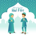 Selamat hari raya Idul Fitri is another language of happy eid mubarak in Indonesian. Cartoon muslim kids celebrating Eid al fitr w