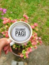 Selamat Pagi message written on coffee cup