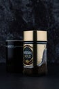 Selangor, Malaysia - April 2020: Nescafe gold instant coffee in a jar with black cup over dark background Royalty Free Stock Photo