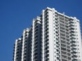 High rise apartment building with modern facade design.