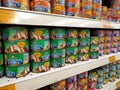 Selected focused on tuna fish fillet in the cans and displayed for sale on shelves in the supermarket. Royalty Free Stock Photo