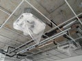 Installation of ceiling cassette air-condition units.