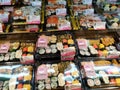 Various types of Japanese sushi ready in packs are on display for sale. Royalty Free Stock Photo