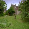 Spring afternoon light on an overcast day - View of St Mary`s Church in Selborne, Hampshire, UK Royalty Free Stock Photo