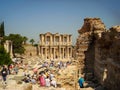 Selcuk, Turkey - June 18 2012 : Tourist visiting Ephesus Ancient City, near Kusadasi. UNESCO World Heritage Site. Celcius Library