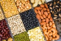 Select different whole grains beans and legumes seeds lentils and nuts colorful snack background top view - Collage various beans Royalty Free Stock Photo