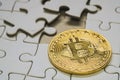 select focus close up a golden bitcoin coin. cryptocurrency. Missing jigsaw puzzle pieces. Business concept Completing final task. Royalty Free Stock Photo