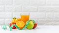Select focus. Diet and healthy fresh fruits vegetable for detox body slim fit for health lifestyle with orange juice Royalty Free Stock Photo