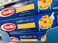 Selected collection of capellini pasta Barilla brand display for sell in french supermarket