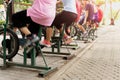 Selected focous on cardio equipment group of people doing exercise on cardio training in the park. Royalty Free Stock Photo