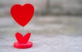 Selected Focus Image of Heart Stand Display on the Ground with Bokeh on the Back for Valentine Theme or Valentine Card