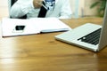 Selected focus on keyboard businessman relaxing while drinking c