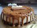 Selected focused on cheesecake with caramel as the topping.
