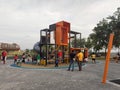 Selected focused on modern children outdoor playground in the public park.