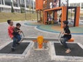 Selected focused on modern children outdoor playground in the public park.
