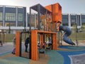 Selected focused on modern children outdoor playground in the public park.