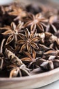 selected star anise stars on a wooden bowl. Royalty Free Stock Photo