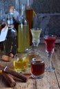 Selection of alcoholic drinks and cigars. Set of wine, brandy, liqueur, tincture, cognac, whiskey in glasses, bottles. Large varie