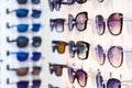 Selection of branded eyeglasses in an optician retail shop in Poland.