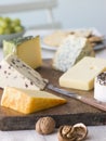 Selection of British Cheeses with Walnuts Biscuits Royalty Free Stock Photo