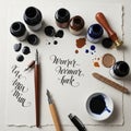 A selection of calligraphy tools arranged on a textured paper sheet. There are multiple Royalty Free Stock Photo