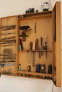 Selection of carpentry tools in cabinet Royalty Free Stock Photo