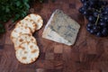 A selection of cheese, grapes, crackers and fresh coriander Royalty Free Stock Photo