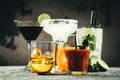 Selection of classic cocktails - cosmopolitan, mojito, bloody mary, old fashioned, margarita, aperol