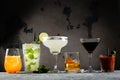 Selection of classic cocktails - cosmopolitan, mojito, bloody mary, old fashioned, margarita, aperol