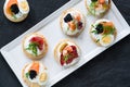 Selection of cocktail blinis - gourmet party food Royalty Free Stock Photo