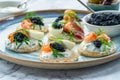 Selection of cocktail blinis - gourmet party food Royalty Free Stock Photo