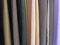 Selection of colorful fabrics for curtains, rolls of fabrics. Woolen, textiles. Royalty Free Stock Photo