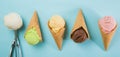 Selection of colorful ice cream scoops on blue background Royalty Free Stock Photo